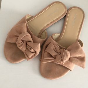 pink bow slip ons